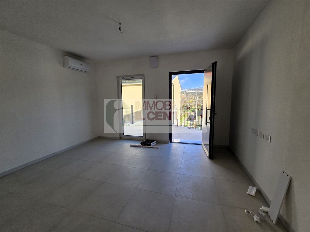 BILOCALE CON TERRAZZA E UN POSTO AUTO