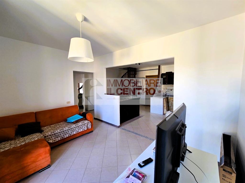 APPARTAMENTO SU DUE LIVELLI CON POSTO AUTO